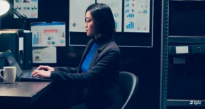 female workplace manager analyzing workplace data